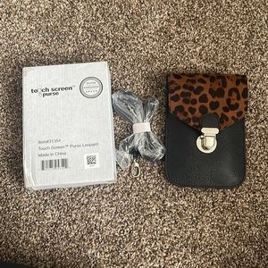 Brand new Leopard touch screen purse.